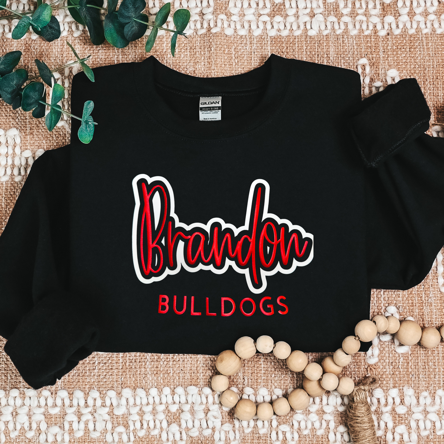 Brandon Bulldogs Metallic puff outlined in white flock sweatshirt.