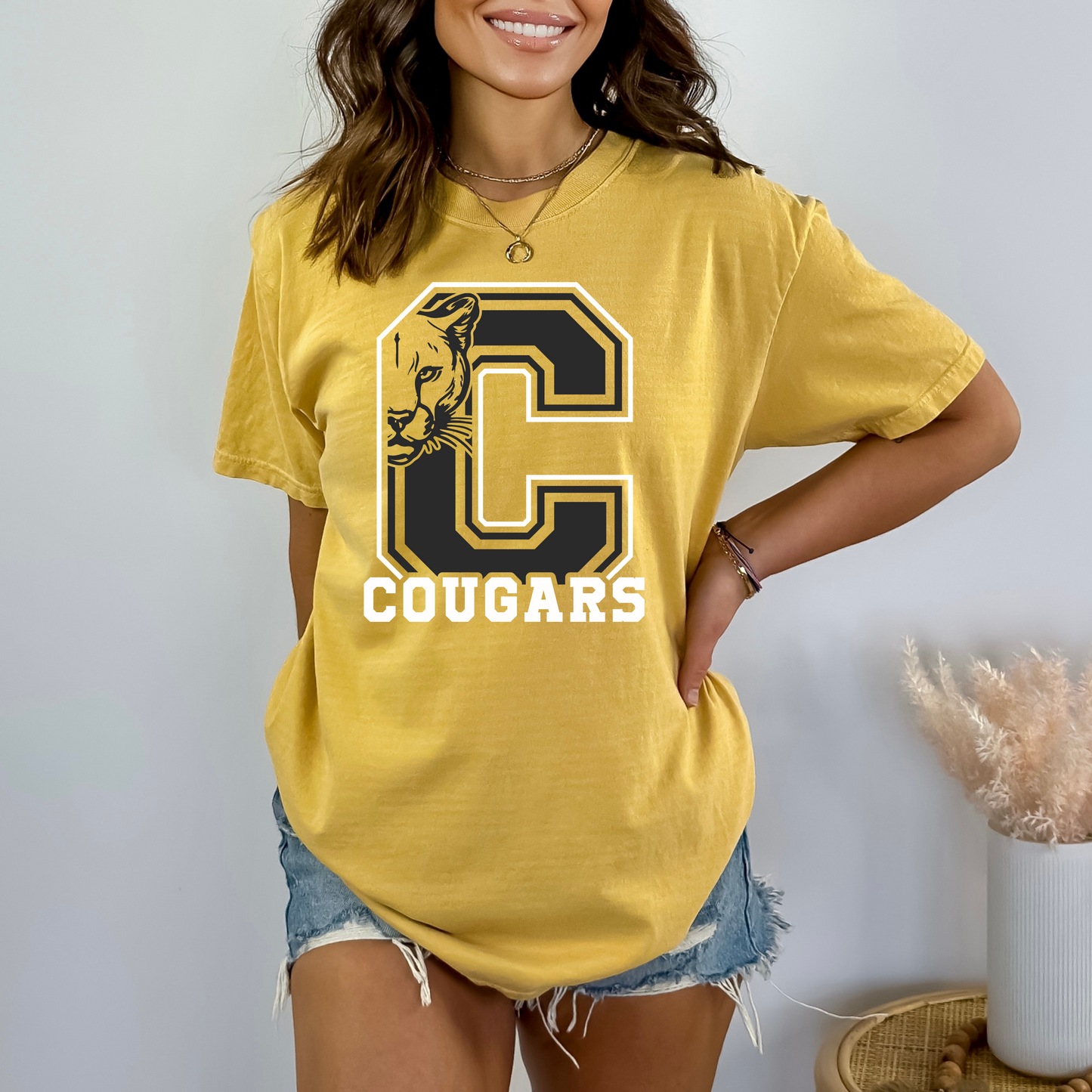 Cougars Bella Canvas T-Shirt – Collegiate Style with Bold “C” Graphic (Available in Ash, Sport Grey, Mustard, & Natural)